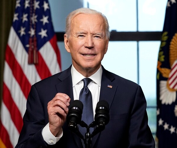 joe biden speaks from podium in treaty room