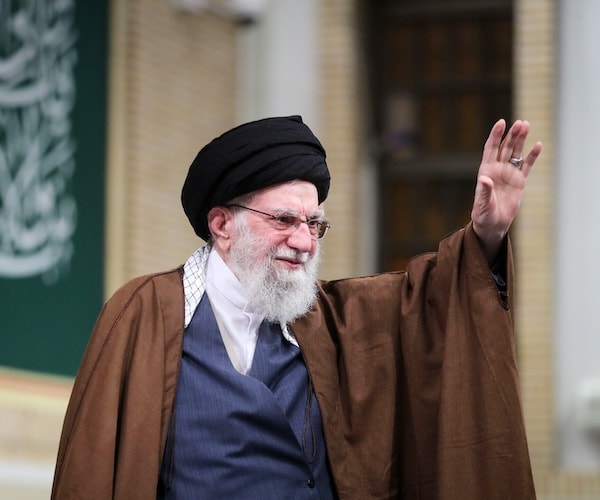 Ayatollah Ali Khamenei waves