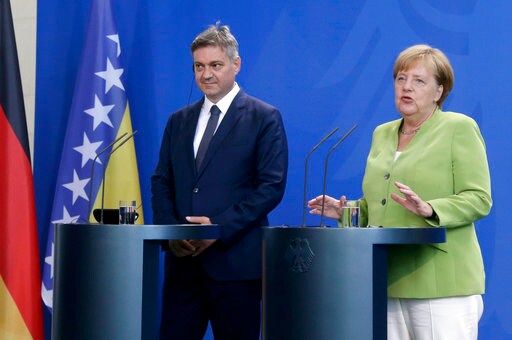 Germany's Merkel Slaps Down Talk of Working with Leftists