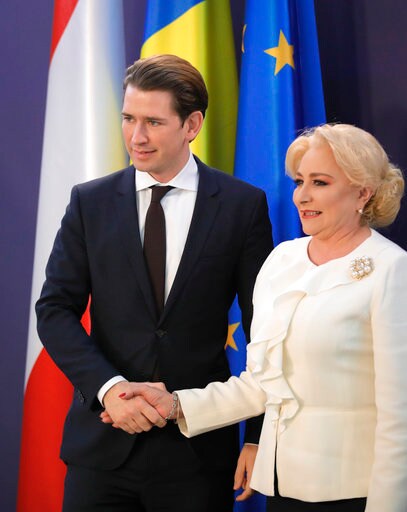 Amid Criticism, Romanian Gov't Taxes Banks, Energy Companies