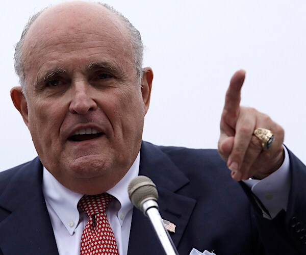 rudy giuliani gestures while delivering remarks at a news conference