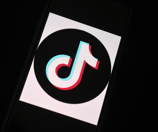 the tiktok app logo is seen