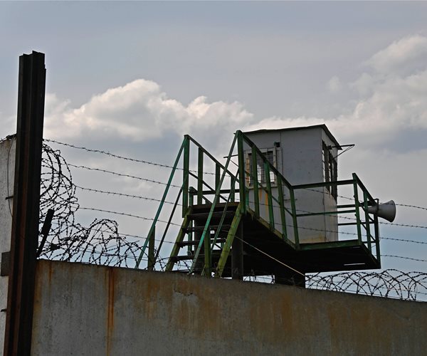 A wall and guard post