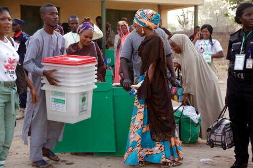 The Latest: Nigeria Finally Begins Voting for President