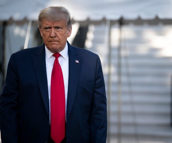 president donald trump speaks to reporters