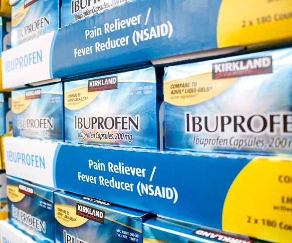 boxes of ibuprofen medicine in blue and yellow boxes