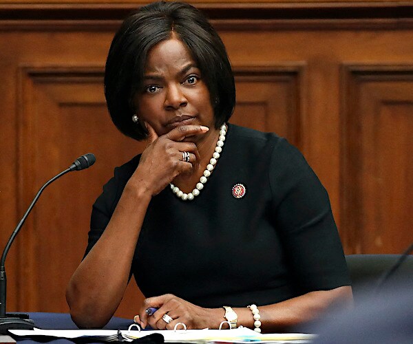 val demings listens during a congressional hearing