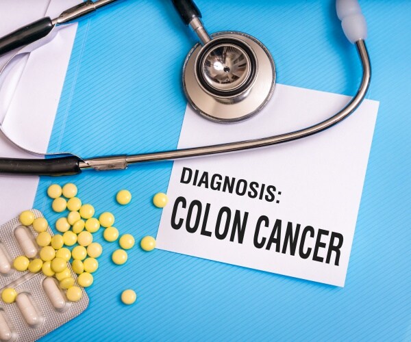 diagnosis 'colon cancer', pills, stethoscope