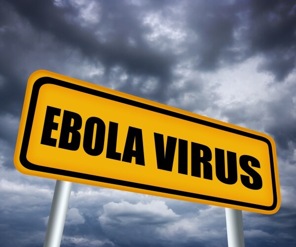 yellow road sign saying "Ebola Virus"