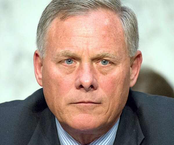 richard burr sits stoically during a hearing
