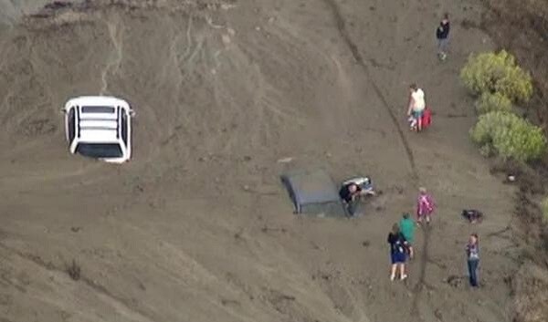 Drivers Trapped in Mud as Flash Flooding Hits LA Freeways