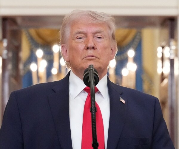 donald trump speaks into mic