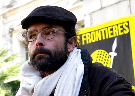 The Latest: French Court Says Helping Migrants Not Illegal