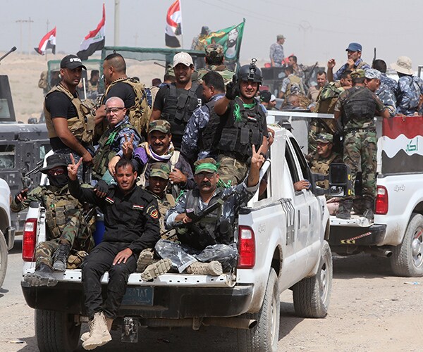 Suicide Attacks in Anbar Kill at Least 18 Iraqi Troops