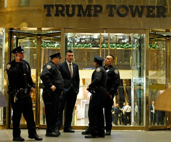 officers standing outside of trump tower
