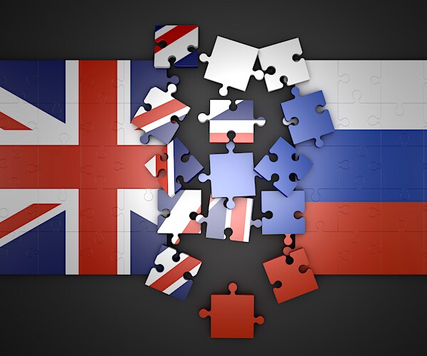 Puzzles in the form of flags of Great Britain and Russia. 3d rendering
