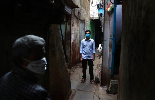 Amid Virus, Those in India's Largest Slum Help One Another