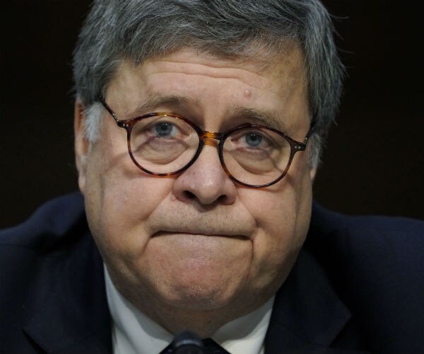 attorney general william barr grimaces during a congressional grilling