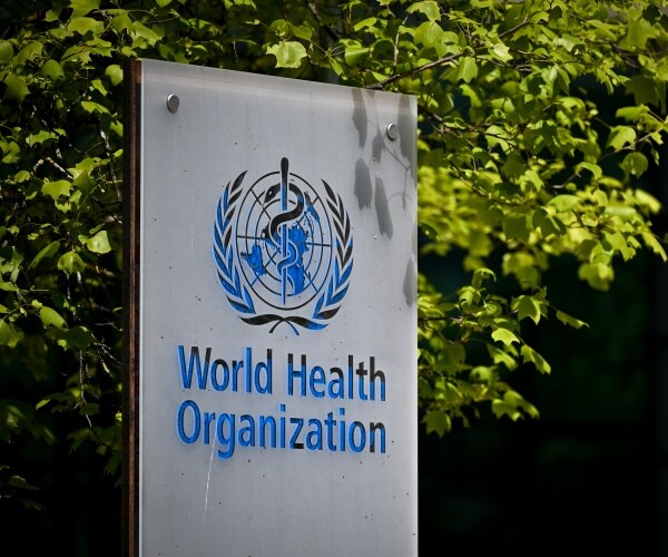 World Health Organization sign outside of the headquarters