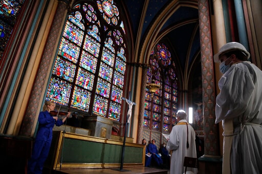Holy Thursday Service Held at Fire-ravaged Notre Dame