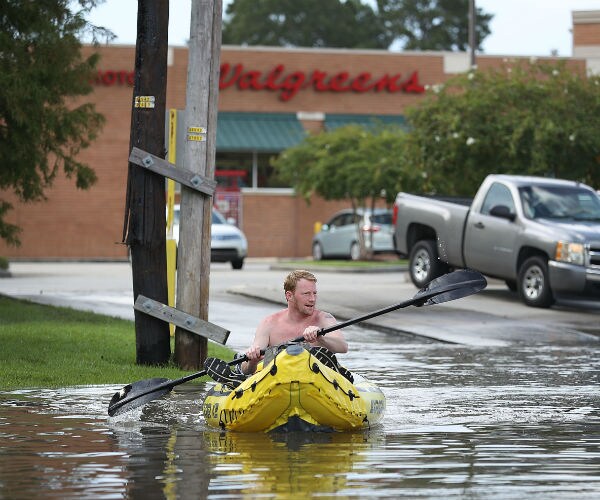 Mike Huckabee Rakes Obama for Vacationing as Floods Ravage Louisiana