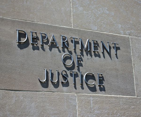department of justice is shown on side of building