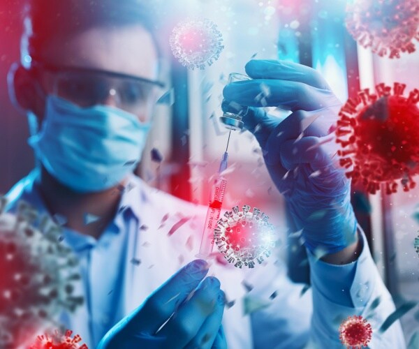 scientist in a lab researching COVID treatments