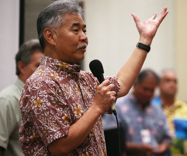 David Ige speaks at a community meeting.