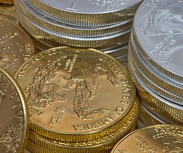 Gold Hits 9-Year High on China-US Woes, Silver Soars to 7-Year Peak