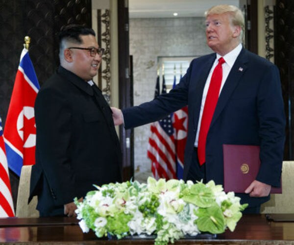 France Alarmed After Trump 'Practically Hugged' Kim