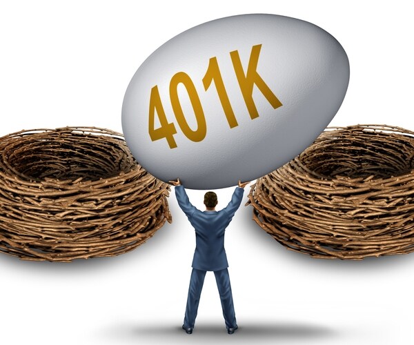 businessman lifting and holding up a giant investment 401 k egg deciding on a strategy for the best nest to invest 
