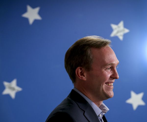 democratic salt lake county mayor ben mcadams stands as he speaks at a news conference.