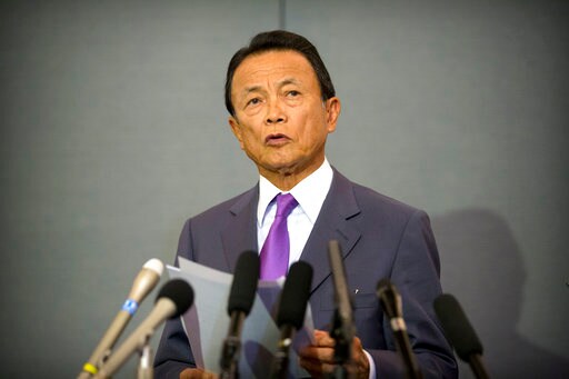 Japan's Aso, Chinese Officials Endorse Global Trade System