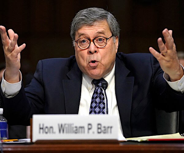 william barr thows up both hands in disgust during a congressional hearing