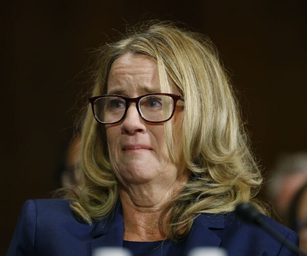 Christine Blasey Ford listens during his Senate Judicary Committee hearing Thursday
