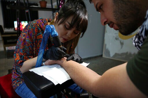 A Tattoo at a Time, Afghan Woman Takes on Society's Taboos