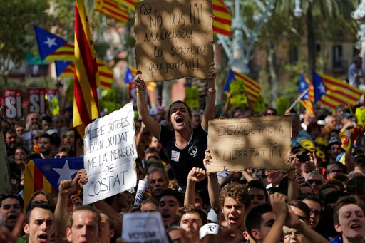 The Latest: Protesters Call for Release of Catalan Officials