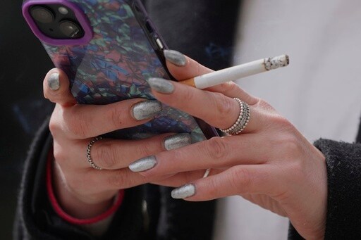 UK Introduces a Tough Anti-tobacco Bill but Smokers Can Puff Away in Pub Gardens for Now