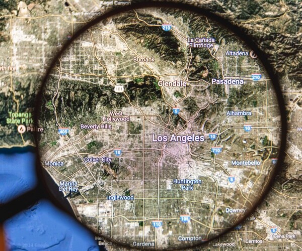 magnifying glass on areas in Los Angeles affected by wildfires