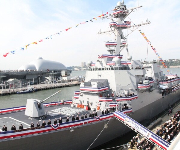 uss michael murphy decorated with flags and red white and blue stripes