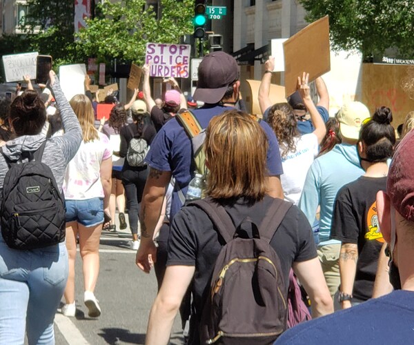 protesters march from the white house to capitol hill