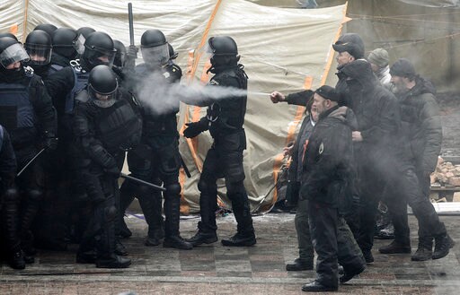 Protesters Clash with Police in Ukraine over New Law
