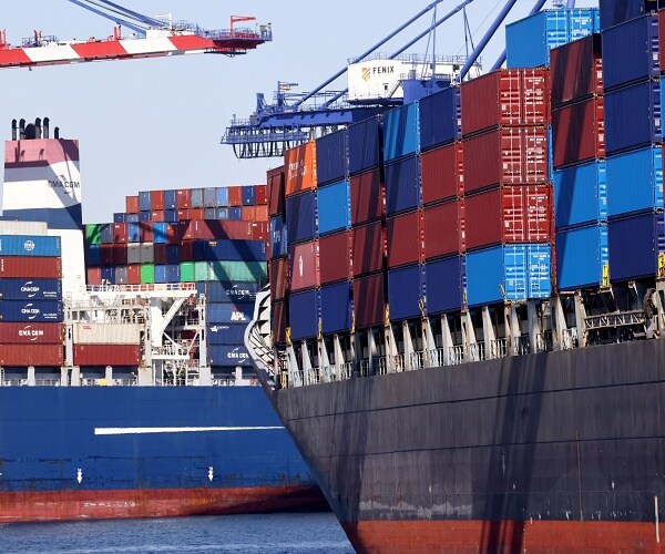 cargo containers stacked on ships
