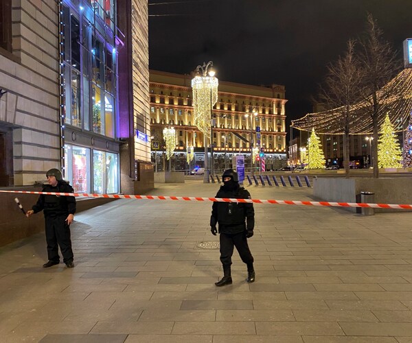 russian police officers secure the area at a shooting near the office of the federal security service in moscow