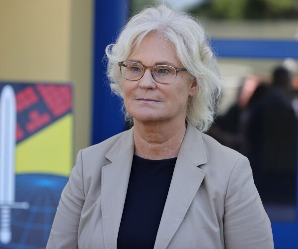 christine lambrecht looks on