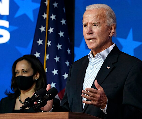 kamala harris and joe biden appear for a national address friday night in wilmington, delaware