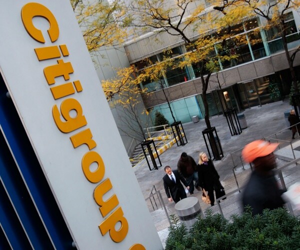 People walk up from the plaza at the Citigroup Center in New York City
