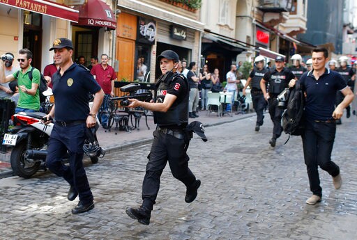 The Latest: Tear Gas, Checkpoints Greet LGBT Pride in Turkey