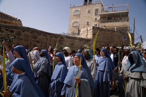 Christians Mark Palm Sunday with Jerusalem Procession