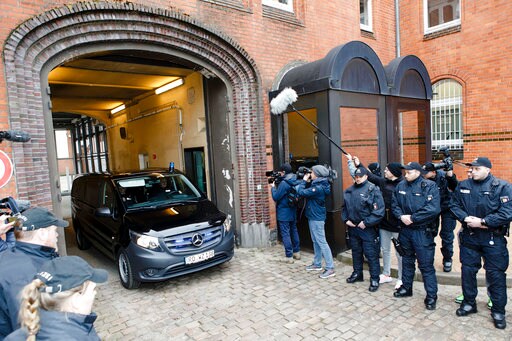 The Latest: German Court Orders Puigdemont Held in Custody